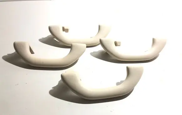 Volkswagen Tiguan A set of handles for the ceiling 1K0857607K 1K0857607L