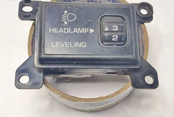 Mazda 626 Headlight level height control switch