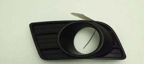 Suzuki Swift I Front fog light trim/grill 7175172KIR