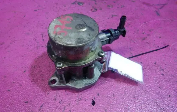 Nissan Almera Tino Vacuum pump