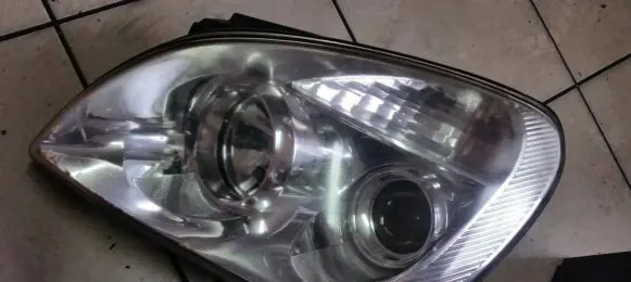 KIA Carens III Headlight/headlamp 921011D0