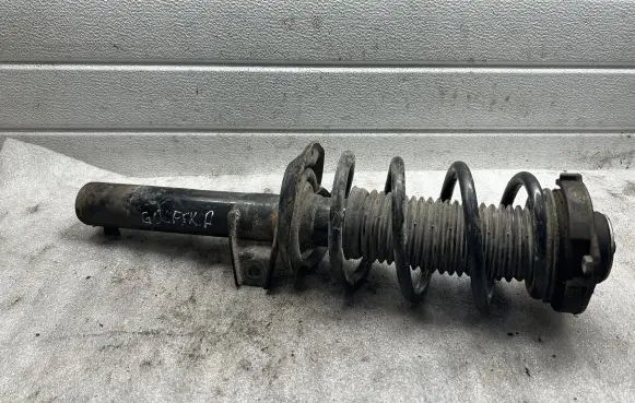 Volkswagen Golf V Front shock absorber/damper 1K0412381A