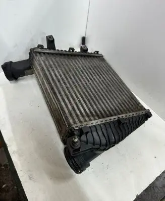 Volkswagen Touareg I Intercooler radiator 7L6145803C