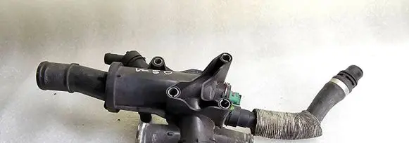 Thermostat/thermostat housing