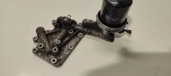Subaru Outback Oil filter mounting bracket 0C982