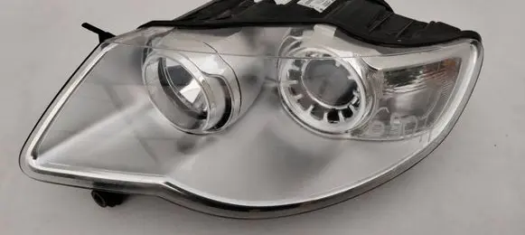 Volkswagen Touareg I Headlight/headlamp 7L6941031A 1LL24703203 24703203000055
