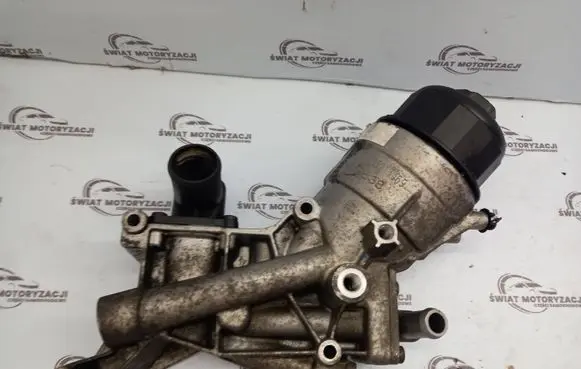 Opel Corsa D Engine oil radiator 55213469