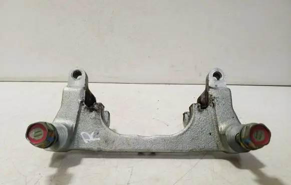 Subaru Impreza VI Brake caliper pad carrier rear 
