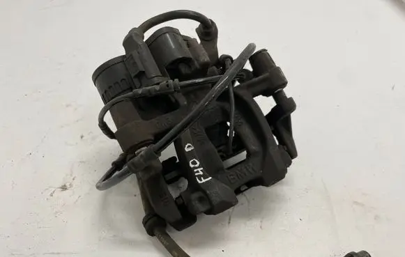 BMW 1 F40 Rear brake caliper 1543680