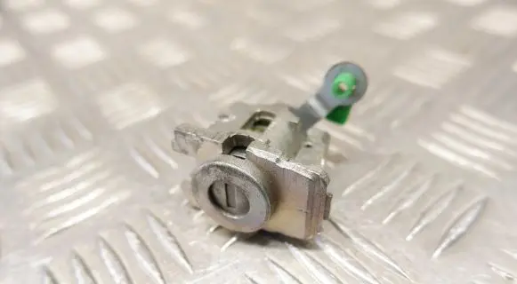 Nissan Leaf II (ZE1) Front door lock (next to the handle) 