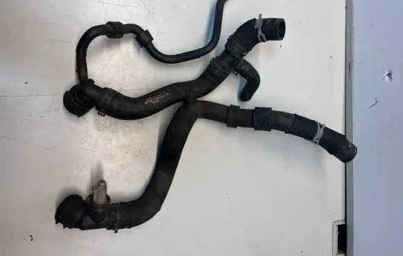 Volkswagen Golf VI Engine coolant pipe/hose 1K0121049CA