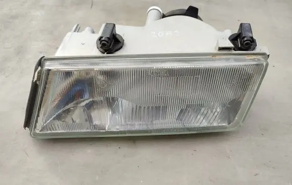 Lancia Dedra Headlight/headlamp 7R0143990
