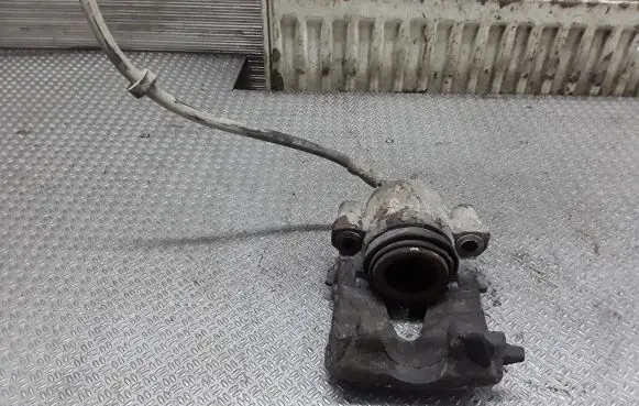 Volkswagen Golf IV Front brake caliper