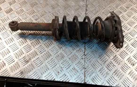 Nissan Almera Tino Rear shock absorber with coil spring 