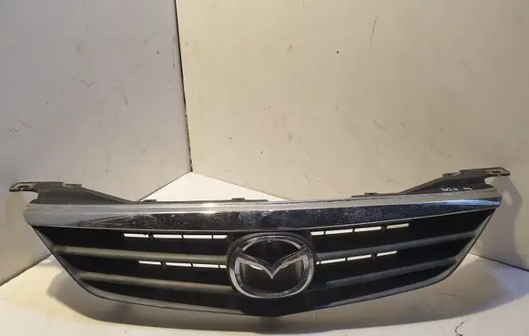 Mazda 626 Front bumper upper radiator grill GG2M50712