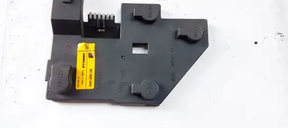 Tail light bulb cover holder