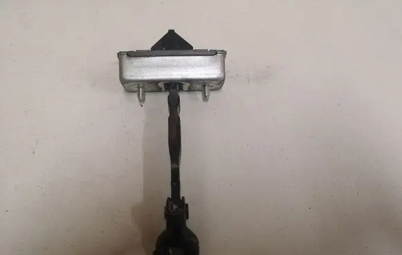 Mazda 6 Rear door check strap stopper
