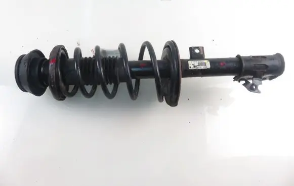 Suzuki Swift I Front shock absorber with coil spring 4160263J61