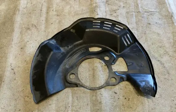 Toyota Yaris XP210 Front brake disc dust cover plate