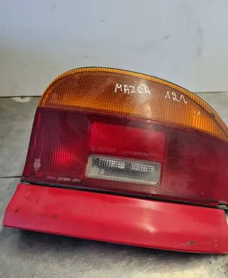 Mazda 121 SM Tail light bulb cover holder 22061364