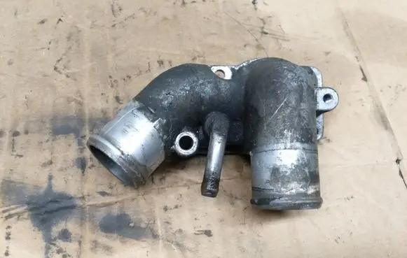 Thermostat/thermostat housing
