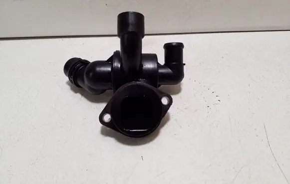 Thermostat/thermostat housing