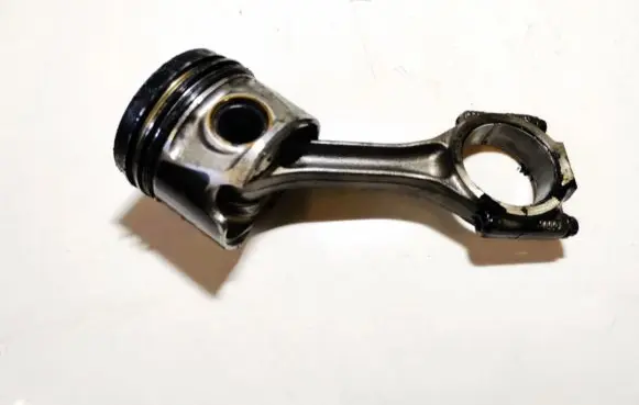 Volkswagen Touran I Piston with connecting rod 038j