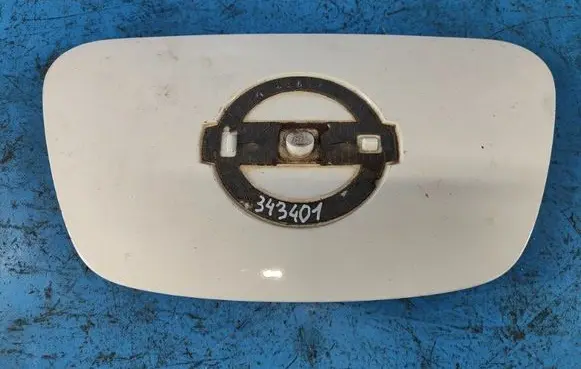 Nissan Leaf I (ZE0) Front tow hook cap/cover 657103NA1A