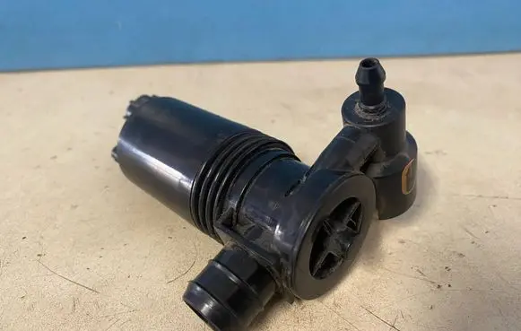 Land Rover Evoque I Windscreen/windshield washer pump 1050007001 312985