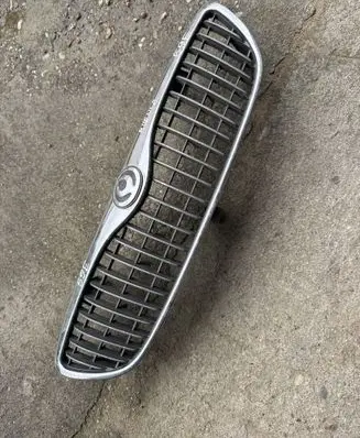 Mazda Millenia Front bumper upper radiator grill T00250711