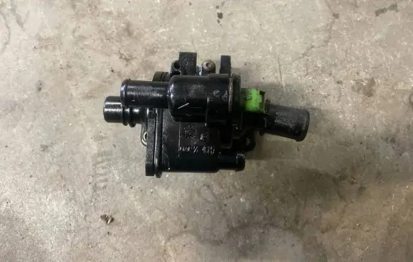 Thermostat/thermostat housing