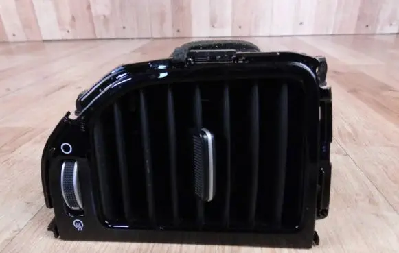 KIA Sportage Dash center air vent grill 97410-F1AA0