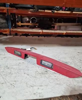 Trunk door license plate light bar
