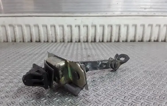 Mazda MPV Front door check strap stopper