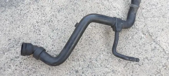 Volkswagen PASSAT B5 Engine coolant pipe/hose 4B0121107E