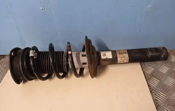 Volkswagen Golf VII Front shock absorber with coil spring 5Q0413031EC 5Q0412022KL
