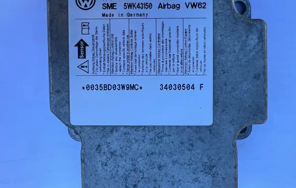 Volkswagen Touran I Airbag control unit/module 1T0909605 34030504F 5WK43150