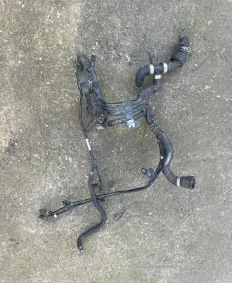 Volkswagen Caddy Engine coolant pipe/hose 04L121064AE