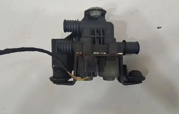 Coolant heater control valve
