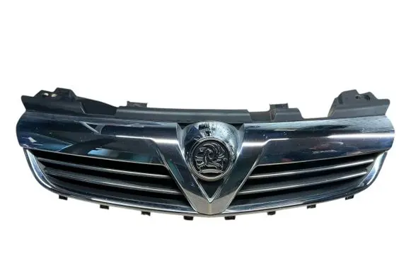 Opel Zafira B Front bumper upper radiator grill 13247331