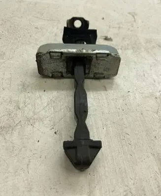 Front door check strap stopper