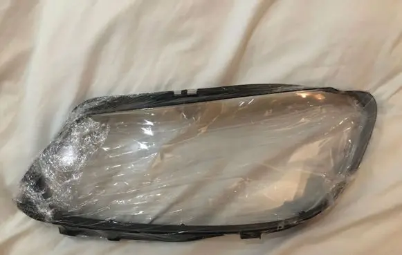 Volkswagen Touran II Headlight lense 