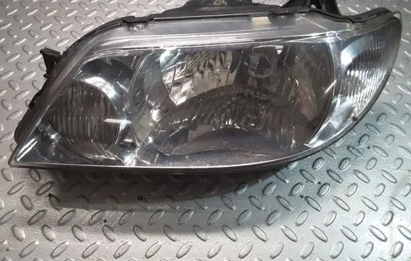 Mazda 323 F Headlight/headlamp P1364