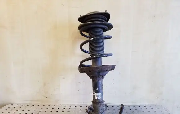 Subaru Legacy Front shock absorber with coil spring 20310AG450