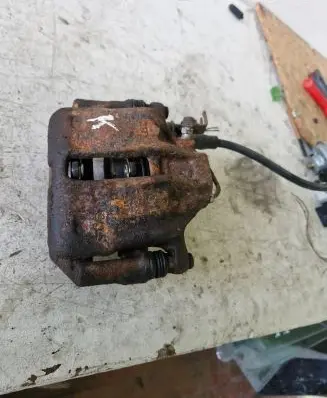 Volkswagen PASSAT B5 Front brake caliper