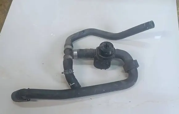 Volkswagen Touareg II Engine coolant pipe/hose 1J0819809
