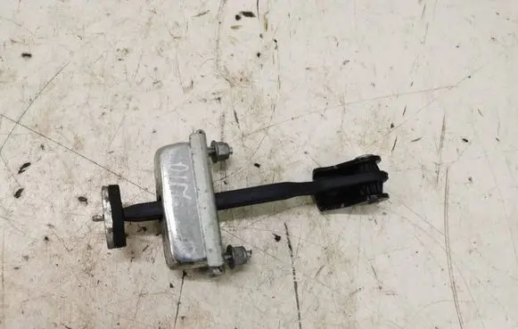 Front door check strap stopper