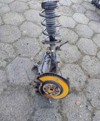 Front shock absorber with coil spring