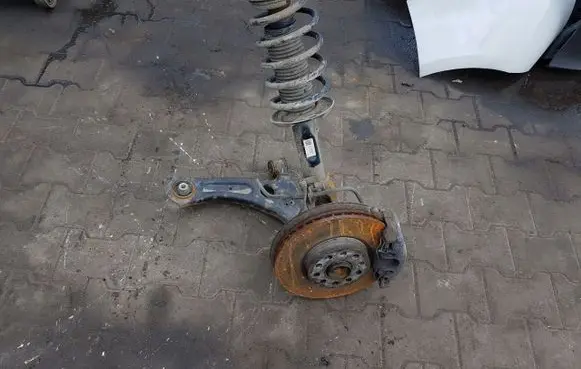 Volkswagen Caddy Front shock absorber with coil spring