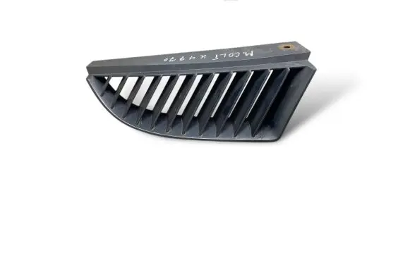 Mitsubishi Colt Front bumper upper radiator grill MN127774 K4770